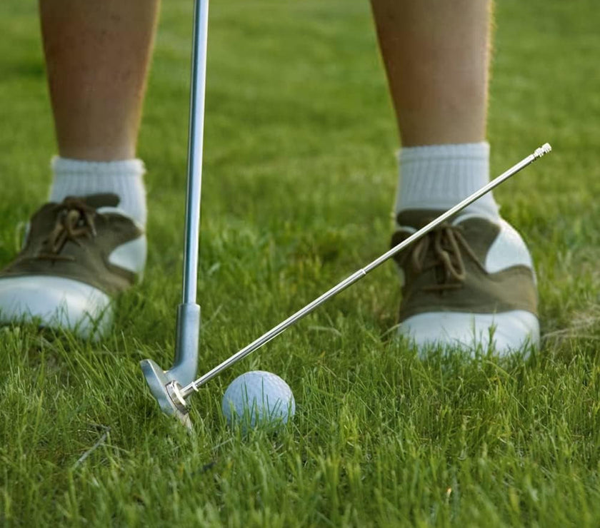 Under Par Discount Golf practicing putting with alignment rod beside putter and ball golf alignment rods sale