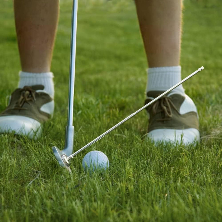 Under Par Discount Golf practicing putting with alignment rod beside putter and ball golf alignment rods sale
