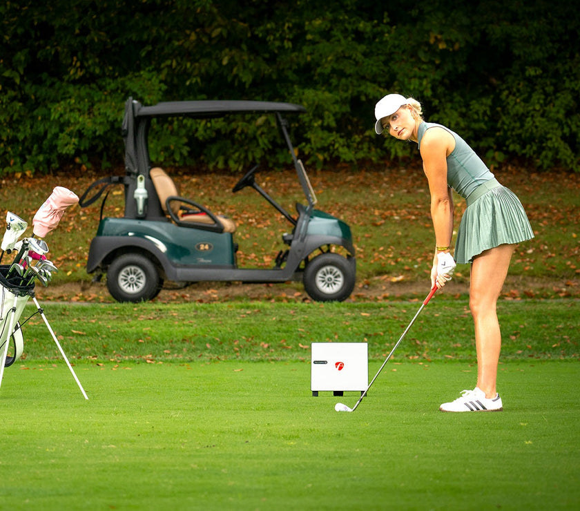 Golf setup with FlightScope X3C Launch Monitor in use on a course.