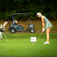 Golf setup with FlightScope X3C Launch Monitor in use on a course.