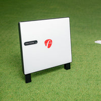 FlightScope X3C Launch Monitor on grass displaying Fusion Tracking technology.