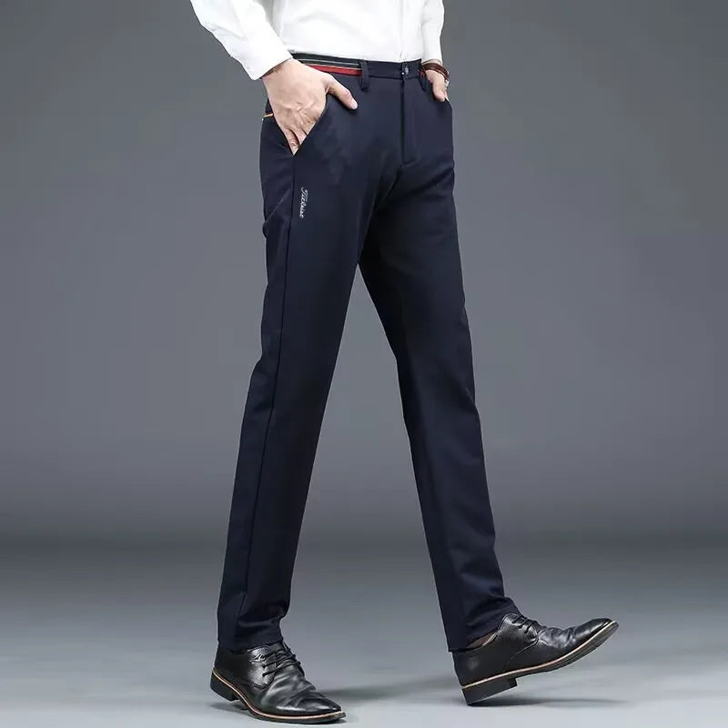 Men's stretch golf pants from Under Par Discount Golf in navy with a tailored fit and comfortable pockets