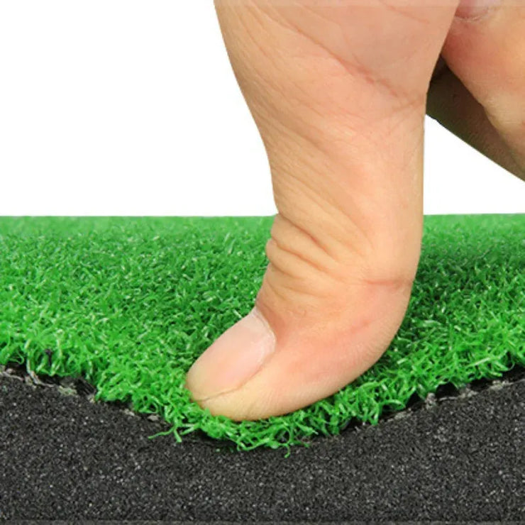 Close up of foam backed green turf showing cushioning on an indoor putting practice mat by Under Par Discount Golf