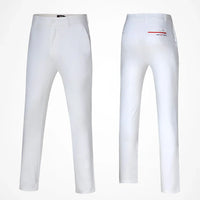 White slim fit golf pants for men with a sleek design, perfect for comfortable golfing.