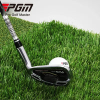 PGM iron and golf ball on lush artificial grass tri-turf golf hitting mat for practice