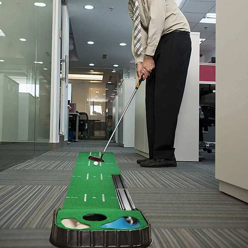 Under Par Discount Golf indoor putting mat set on office floor with man in dress pants practicing putt with two holes and guides