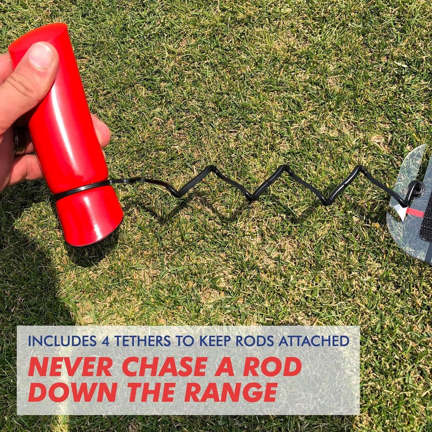 Hand holding red handle of Speed Trap swing trainer with black coiled tether attached to practice rod on grass