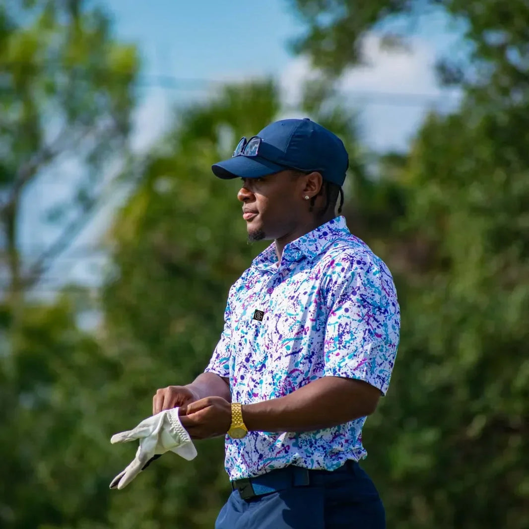 Men's quick dry golf shirt in colorful floral pattern, ideal for warm weather golfing
