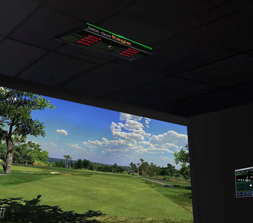 Ceiling-mounted GSA VisTrak Eagle Lite golf launch monitor in a simulation room.