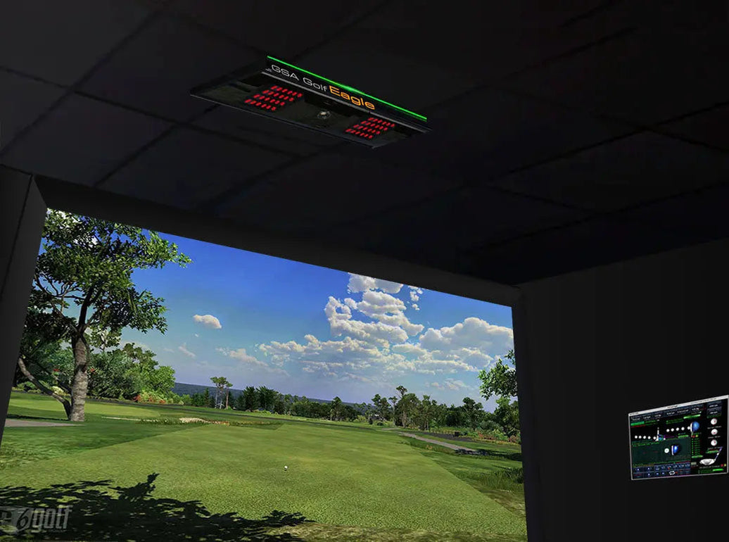 Ceiling-mounted GSA VisTrak Eagle Lite golf launch monitor in a simulation room.