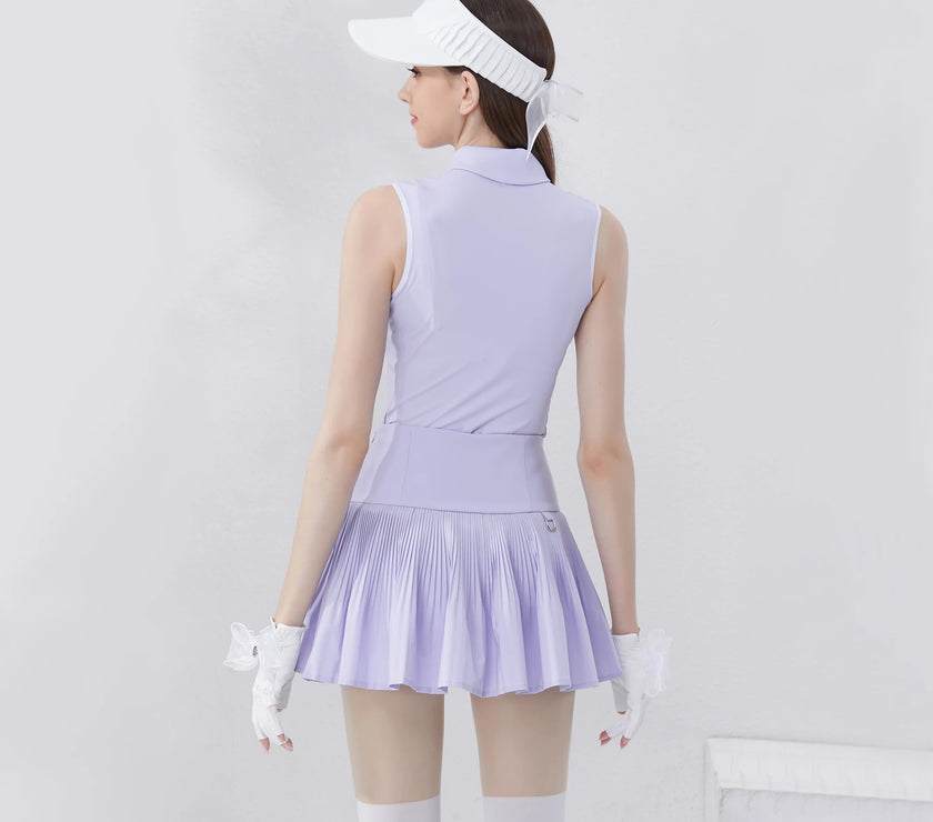 Stylish women's golf polo shirt in lavender with pleated skirt design for an elegant look on the course