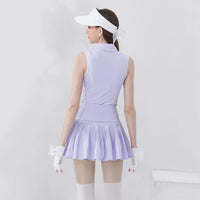 Stylish women's golf polo shirt in lavender with pleated skirt design for an elegant look on the course
