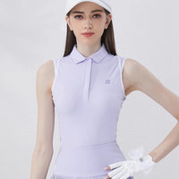 Light purple women's golf polo shirt with a classic collar and fitted design for comfort on the course