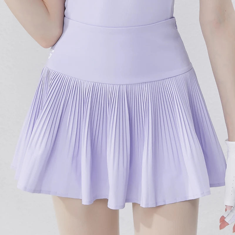 Light purple women's golf polo shirt paired with a pleated skirt for a stylish golf outfit