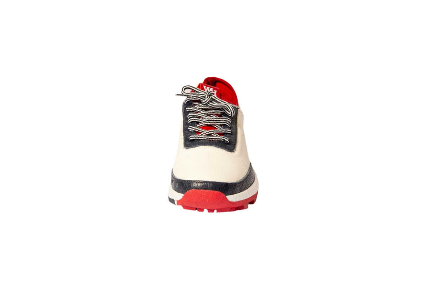 Women's Lynx Deerskin Golf Shoes in navy and red with spikeless design.